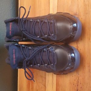 Black with Black patent leather AIR JORDAN. Men's size 8.5 Can fit Women also.